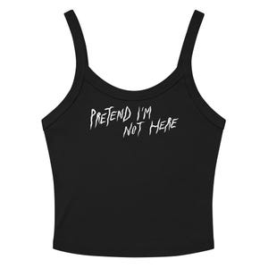 May include: Black crop top with thin straps and the white text "PRETEND I'M NOT HERE". The top is a casual style, suitable for warm weather. The text is in a handwritten style.