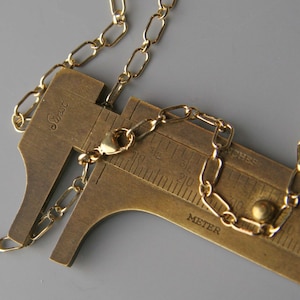 Yellow Gold-Filled 3mm Long & Short Chain, 14/20 gold, by the inch
