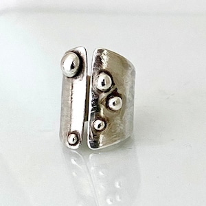 Sculptural sterling silver ring with asymmetrical dots. Bold adjustable jewelry, handmade, modern,  unique, artistic, minimalist style.