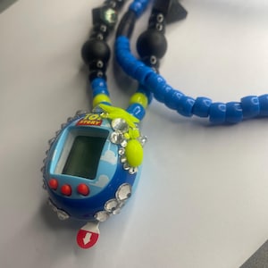One of a Kind ASAP ROCKY Tamagotchi Like Knock Up Beaded Necklace! Blue with Black and Yellow beads.