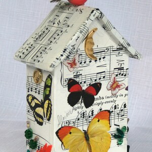 Tiny house butterlies with music, found object art, with a bird