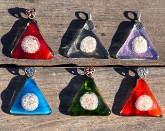 Cremation ashes pendant or key chain.  Fused glass triangular pendant encasing loved one’s cremation ashes. 6 colors. Can be personalized.