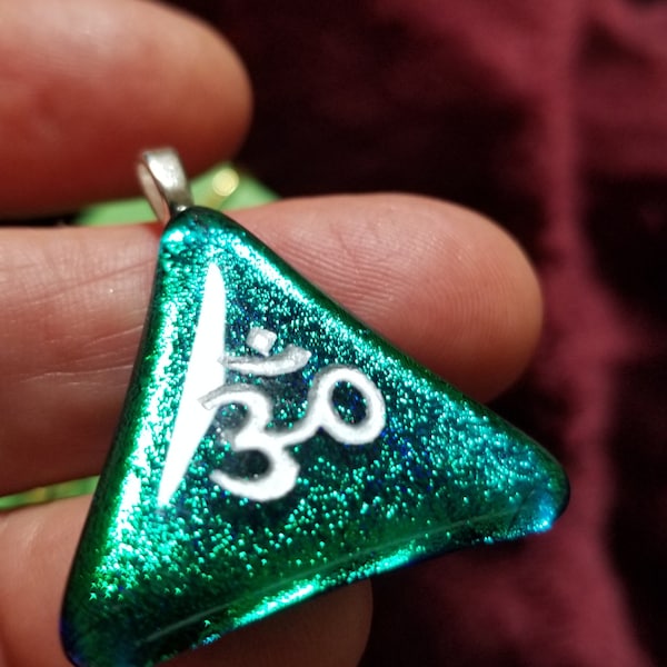 Beautiful triangular dichroic pendants symbolizing spirituality, faith, hope and love.  Reminders of what's really important.