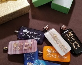 Artistic engraved fused glass pendants with a statement.  Spread inspirational messages and blessings with your jewelry.