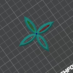 Puede incluir: Un diseño turquesa de cuatro pétalos con un punto azul central y líneas internas rojas y verdes. El objeto se encuentra sobre un fondo de cuadrícula gris, lo que sugiere un modelo 3D o un dibujo técnico.