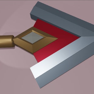 May include: A gold and silver arrow-shaped object with a red and white center. The arrow is made of three pieces, with a gold tip and two silver pieces that form the wings. The arrow is pointing to the right.