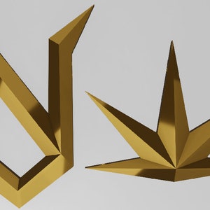 May include: Two gold-colored metal shapes, one is a stylized letter N, the other is a five-pointed star.