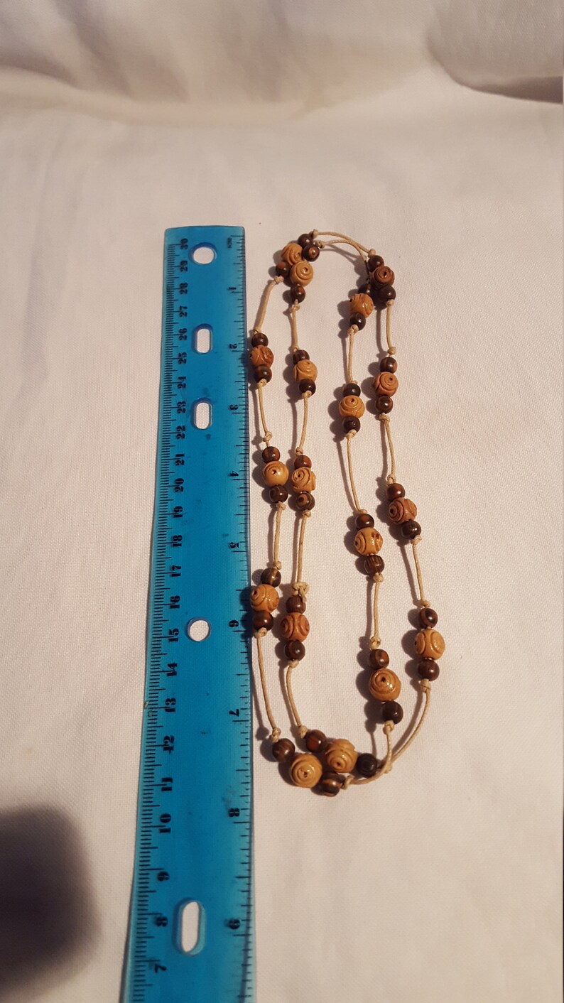 Knotted olive wood bead necklace