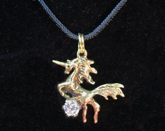 Fanciful Unicorn Pendant set with 5mm Cubic Zirconia created by David Blonski