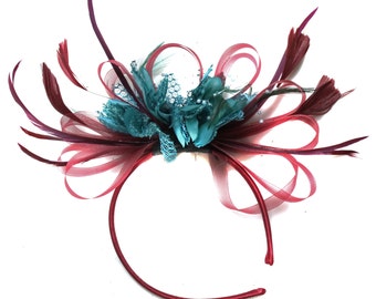 Fascinator Caprilite bordeaux e turchese scuro sulla fascia