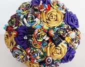 Alternative bouquet wedding flowers paper origami vintage theme comic book marvel lego figure buttonhole bride superhero purple gold blue