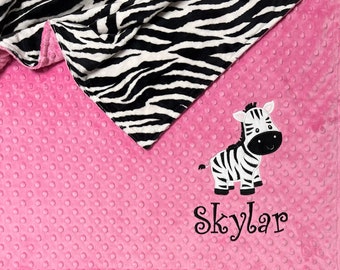 zebra blanket with pink trim