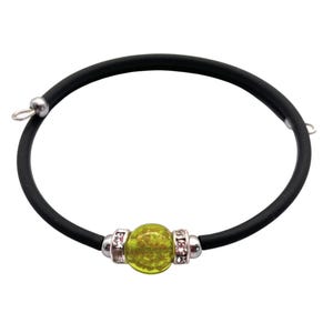 May include: A black elastic bracelet with a single green glass bead and silver accents.