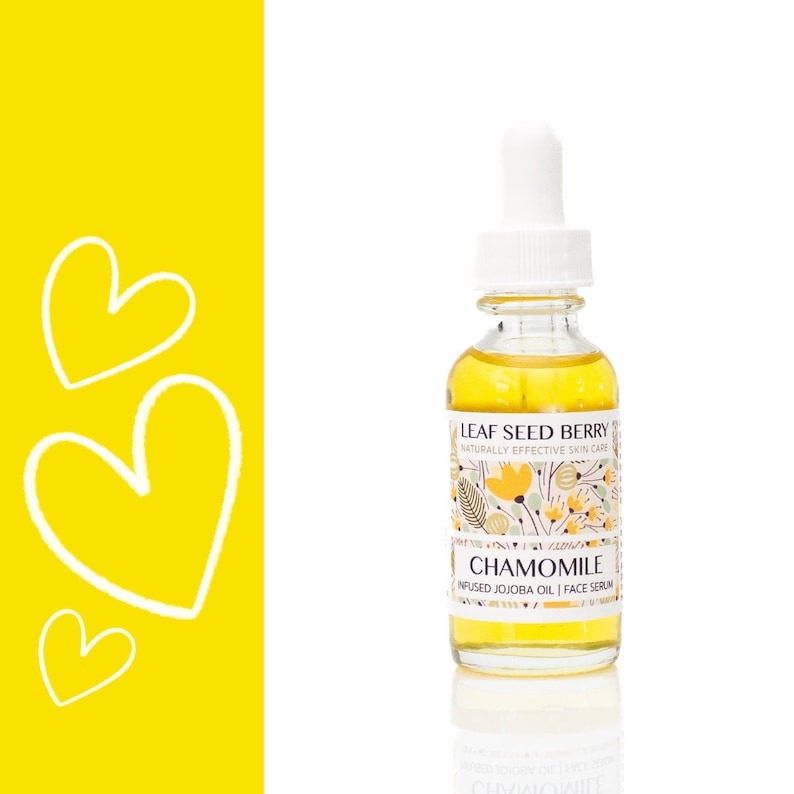 May include: A glass bottle of chamomile infused jojoba oil face serum with a white dropper top and a white label with the text "LEAF SEED BERRY NATURALLY EFFECTIVE SKIN CARE CHAMOMILE INFUSED JOJOBA OIL | FACE SERUM"