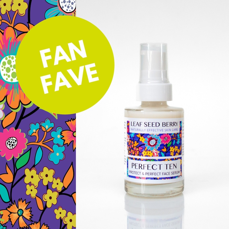 May include: A clear glass bottle with a white pump top and a white label. The label says "LEAF SEED BERRY" and "NATURALLY EFFECTIVE SKIN CARE". Below the label is a smaller label that says "PERFECT TEN" and "PROTECT & PERFECT FACE SERUM".
