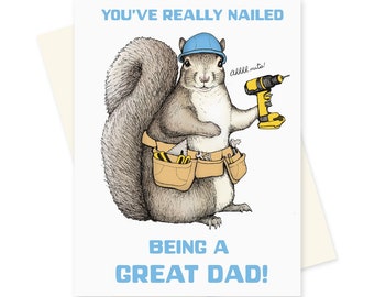 May include: A greeting card with a cartoon squirrel wearing a blue hard hat and holding a drill. The squirrel is wearing a tool belt and the text on the card reads "You've really nailed being a great dad!"
