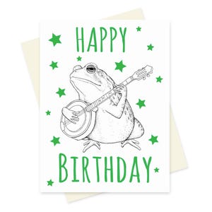Tarjeta de cumpleaños con banjo y rana. Tarjeta de cumpleaños con música bluegrass. Tarjeta de cumpleaños con música. Tarjeta de cumpleaños con sapo. Tarjeta de cumpleaños para novio. Tarjeta de cumpleaños divertida. Tarjeta de cumpleaños geek