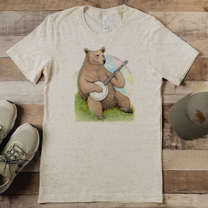 Uniseks T-shirt bluegrass banjobeer. Bluegrass-kleding. Triblend-T-shirt voor heren/dames. Landelijk T-shirt. Geeky-shirt. Bluegrass-festivalcadeau.
