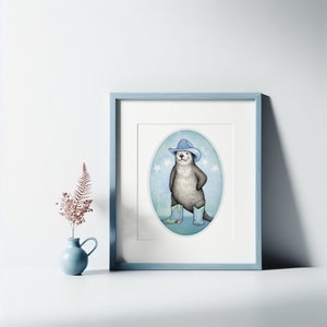 K&ouml;nnte beinhalten: Eine Aquarell-Illustration eines Otters, der einen blauen Cowboyhut und blaue Stiefel tr&auml;gt und auf einem blauen und wei&szlig;en ovalen Hintergrund mit wei&szlig;en Sternen steht.