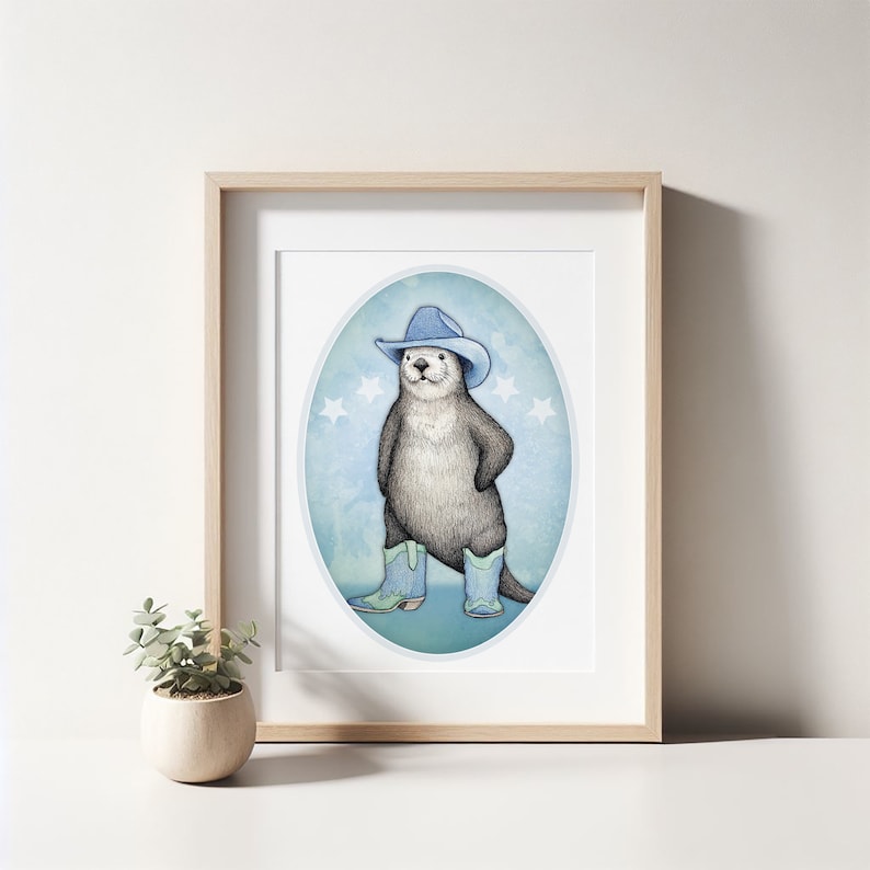 K&ouml;nnte beinhalten: Eine Aquarell-Illustration eines Otters, der einen blauen Cowboyhut und blaue Stiefel mit gr&uuml;nen Akzenten tr&auml;gt. Der Otter steht auf einem blauen Hintergrund mit wei&szlig;en Sternen.