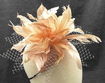 Kentucky derby fascinator hat in champagne/blush pink with feathers and veiling. READY TO SHIP Kentucky derby handmade hats.