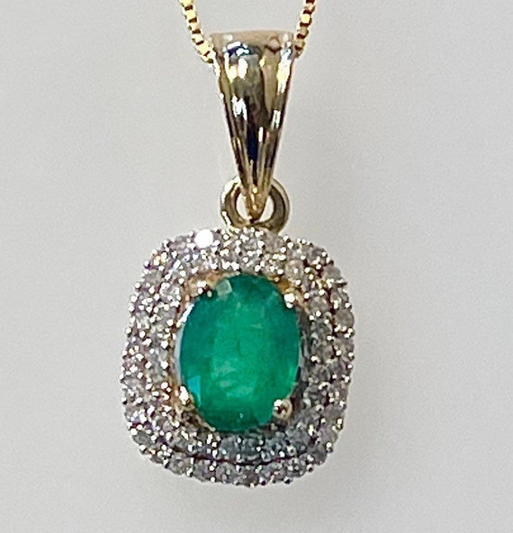 14k Emerald and Diamond Halo necklace