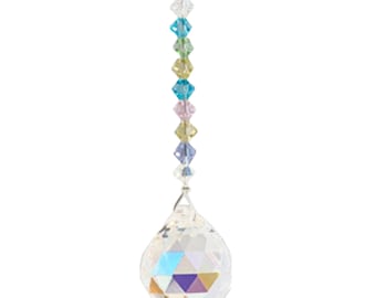 May include: A crystal suncatcher with a rainbow of colors and a clear crystal ball at the bottom.