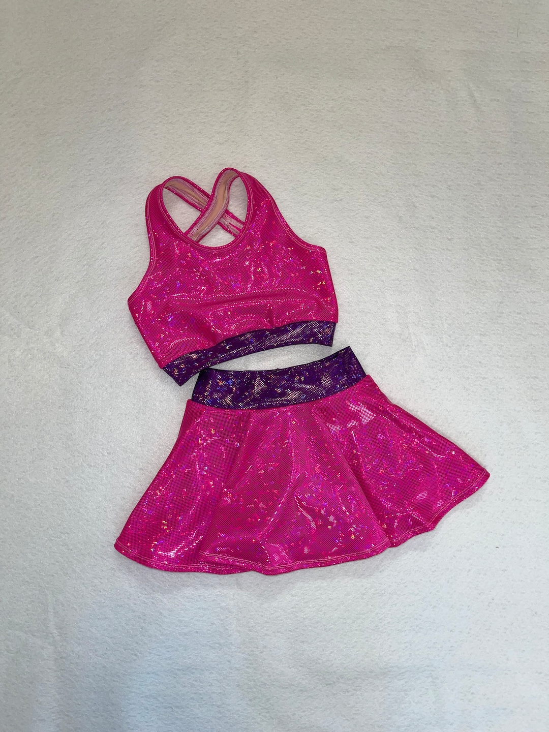 The roze Girls Dancewear Sports Bra, Skirt, and Optional Cheer