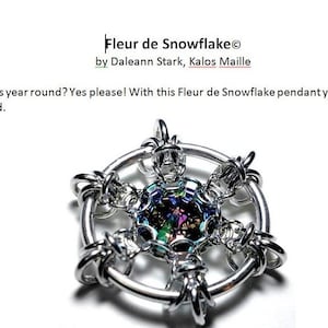 May include: Silver snowflake pendant with a iridescent gemstone in the center. The pendant is made with a wire-wrapped technique and is a unique piece of jewelry. Fleur de Snowflake© by Daleann Stark, Kalos Maille.