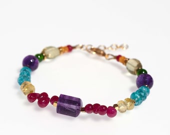 Bracciale con pietre preziose dai colori intensi, placcato oro vero