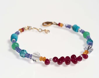 Bracciale con pietre preziose dai colori intensi, placcato oro vero