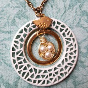 Birds Nest Necklace -mini nest with yellow beads in white filigree and gold ring with bird