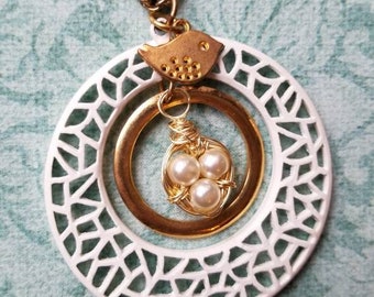 Birds Nest Necklace -mini nest with yellow beads in white filigree and gold ring with bird