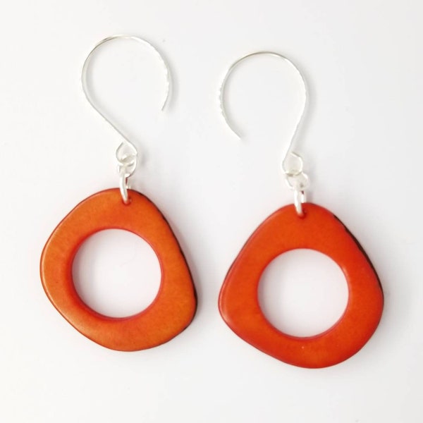 More Colors. Natural Tagua Hoops in Red, Pink or Orange. Light Weight and Fair Trade. Sterling Silver and Red. Sterling Silver and Pink.