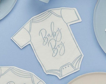 May include: White paper napkin shaped like a baby onesie with blue outline and the text "Baby Boy" in blue script.