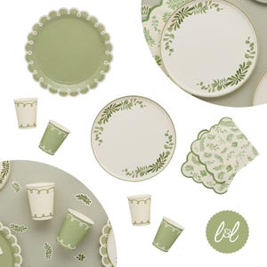 May include: A selection of green and white party tableware, featuring plates, cups, and napkins. The plates have scalloped edges or a botanical design. The cups are two-tone, and the napkins have a leaf pattern. The theme is a nature-inspired party.