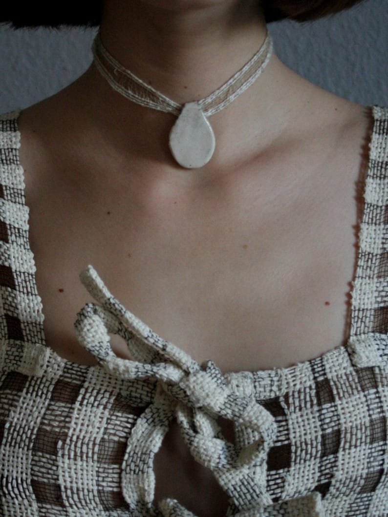 White and Beige Handwoven Pendant Collar
