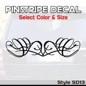 May include: Black pinstripe decal with an ornate, symmetrical design. The decal is displayed on the rear window of a vehicle. Text at the top reads "PINSTRIPE DECAL" and "Select Color & Size". The style is labeled "Style SD13".