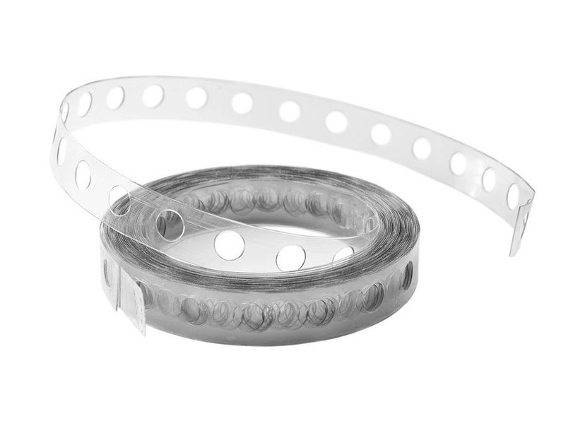 May include: A roll of clear plastic balloon arch tape with evenly spaced holes. The tape is rolled up and a section is unrolled, showing the holes.