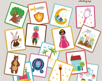 Pode incluir: Um conjunto de 12 flashcards coloridas com ilustrações de vários personagens e objetos de contos de fadas. Os cartões apresentam um bebê dormindo em uma lua crescente, uma princesa com um vestido rosa, um urso, uma espada e um escudo, uma varinha mágica, uma casa, uma chaleira, uma carruagem, um coelho, um homem com turbante, um golfinho, um espelho e uma árvore com um lobo.