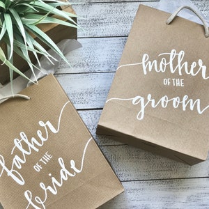 wedding gift bags . personalized gift bags . father of the bride . mother of the bride . father of the groom . mother of the groom .