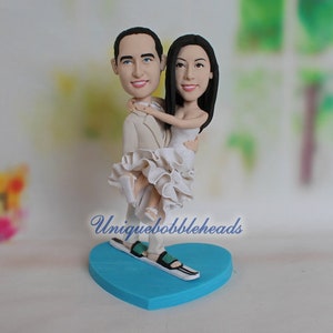 custom wedding topper custom cake topper wedding skiing groom holding bride wedding cake topper