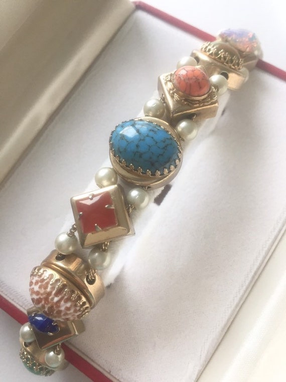 SLIDE ANTIQUE BRACELET Antique Slide Bracelet.1940