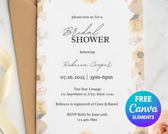 May include: A bridal shower invitation with floral accents and the text "Bridal Shower" in elegant script. The invitation includes details such as the honoree's name, date, time, and location. A brown envelope is behind the invitation.
