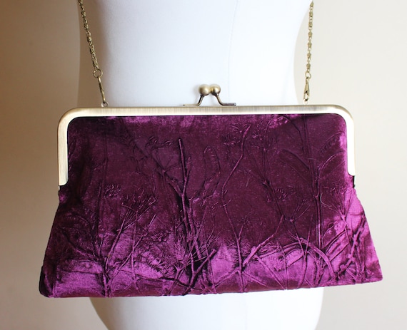 aubergine clutch bag