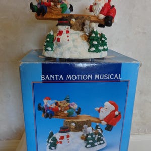 Santa Motion Musical Teeter-Totter Plays Santa Claus is Coming to Town (#2730)
