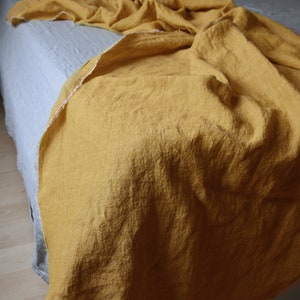 linen throw blanket in mustard yellow color