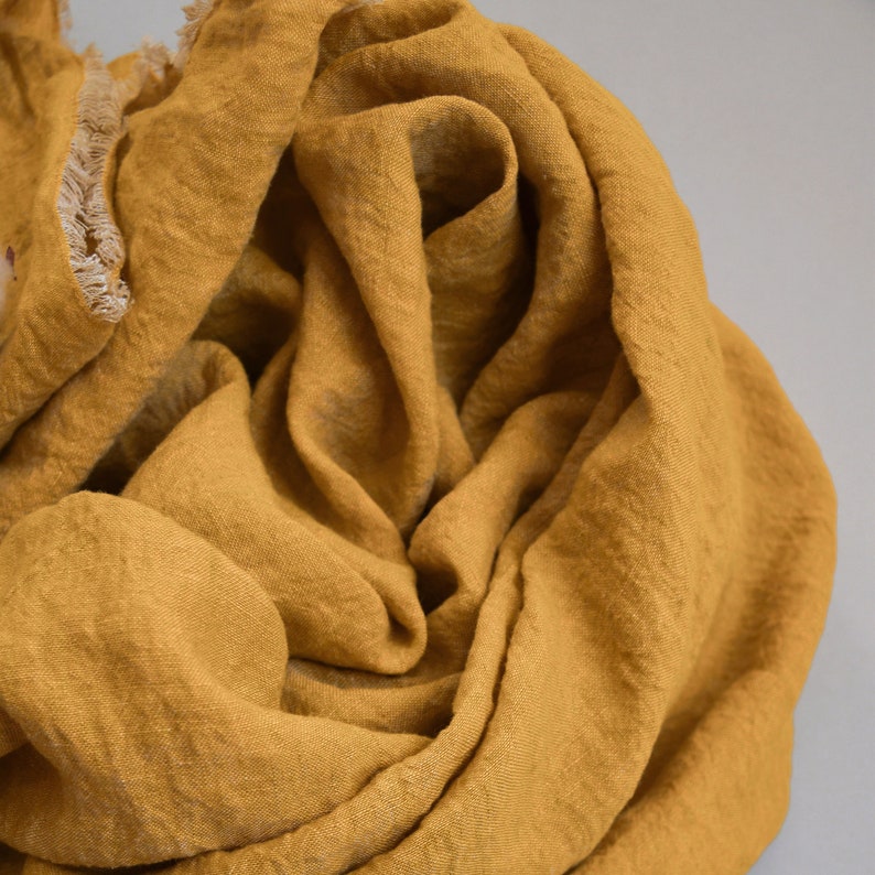 Lightweight linen throw blanket in mustard yellow color