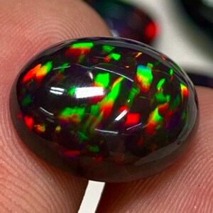 Ópalo - Ópalo negro natural Welo Ópalo etíope Mejor calidad con increíble destello múltiple Fuerte fuego Cabujón Tamaño - 12,5 x 16 mm Altura - 7,5