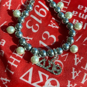 Sliver beaded Delta Sigma Theta bracelet.